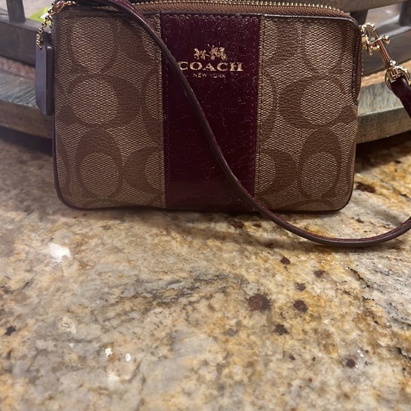 Coach wristlet wallet. Dark brown maroon leather and Coach logo design. - Picture 3 of 5